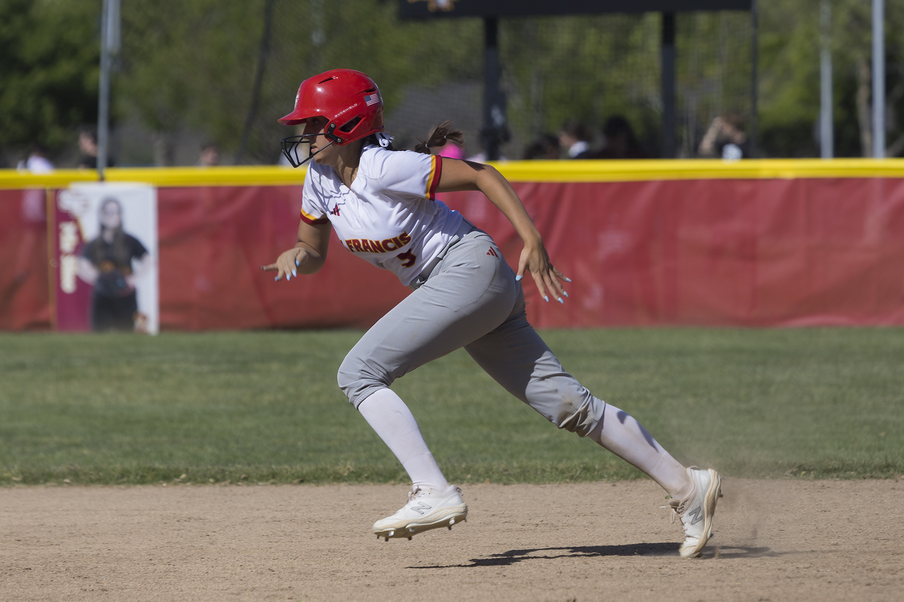 SF pulls away late in wild league win over Davis