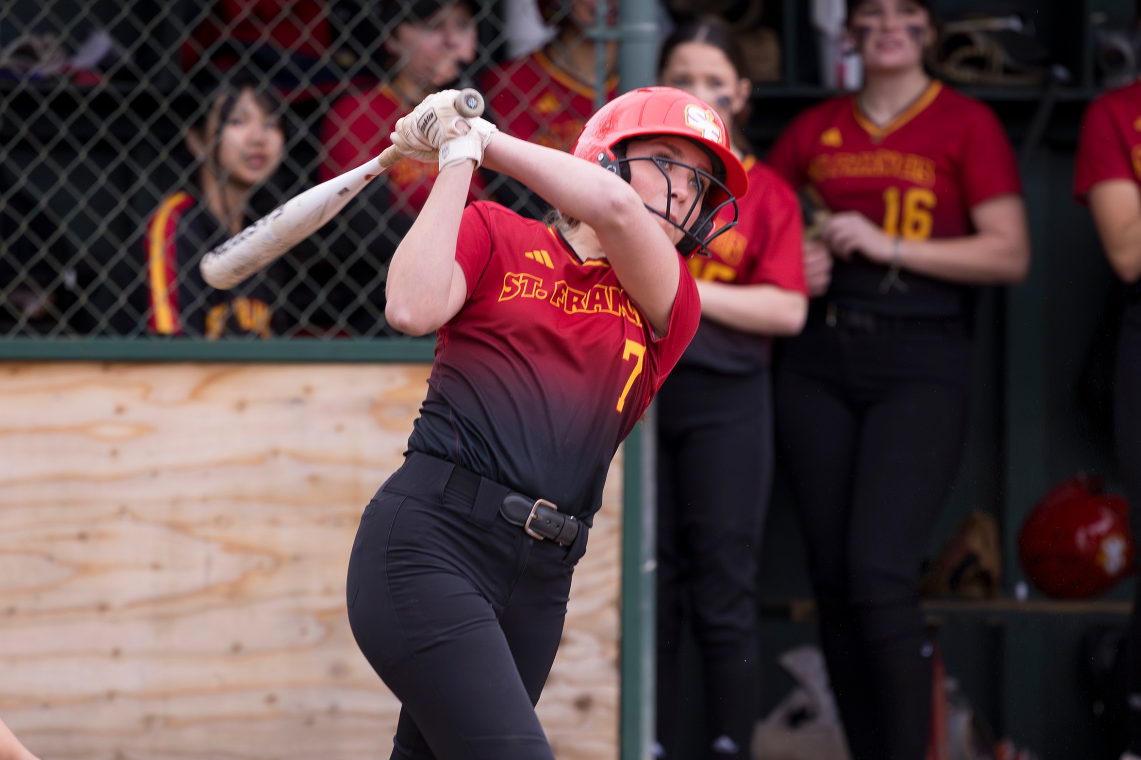 Softball drops season opener to former leaguemate