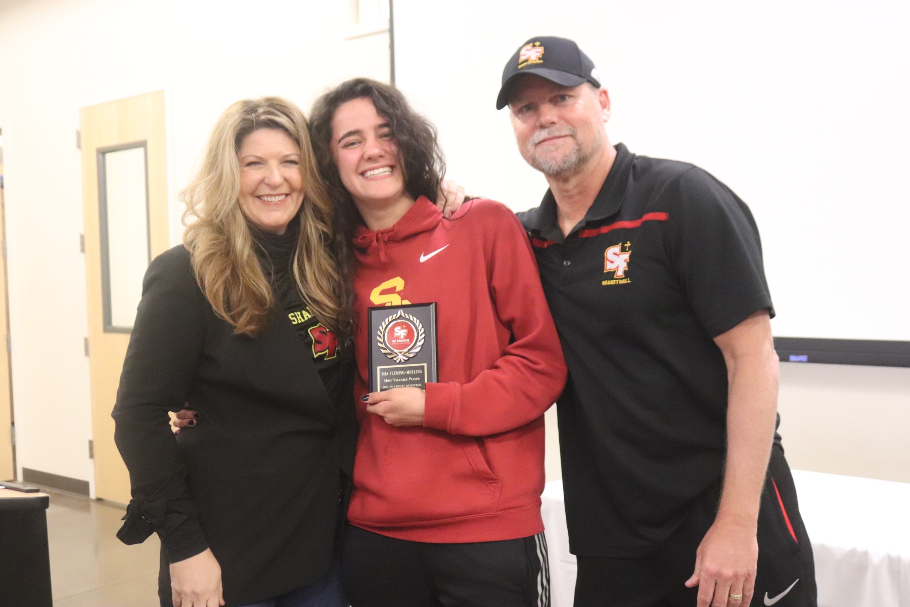 Fleming-Mullins Named MVP at Basketball Banquet