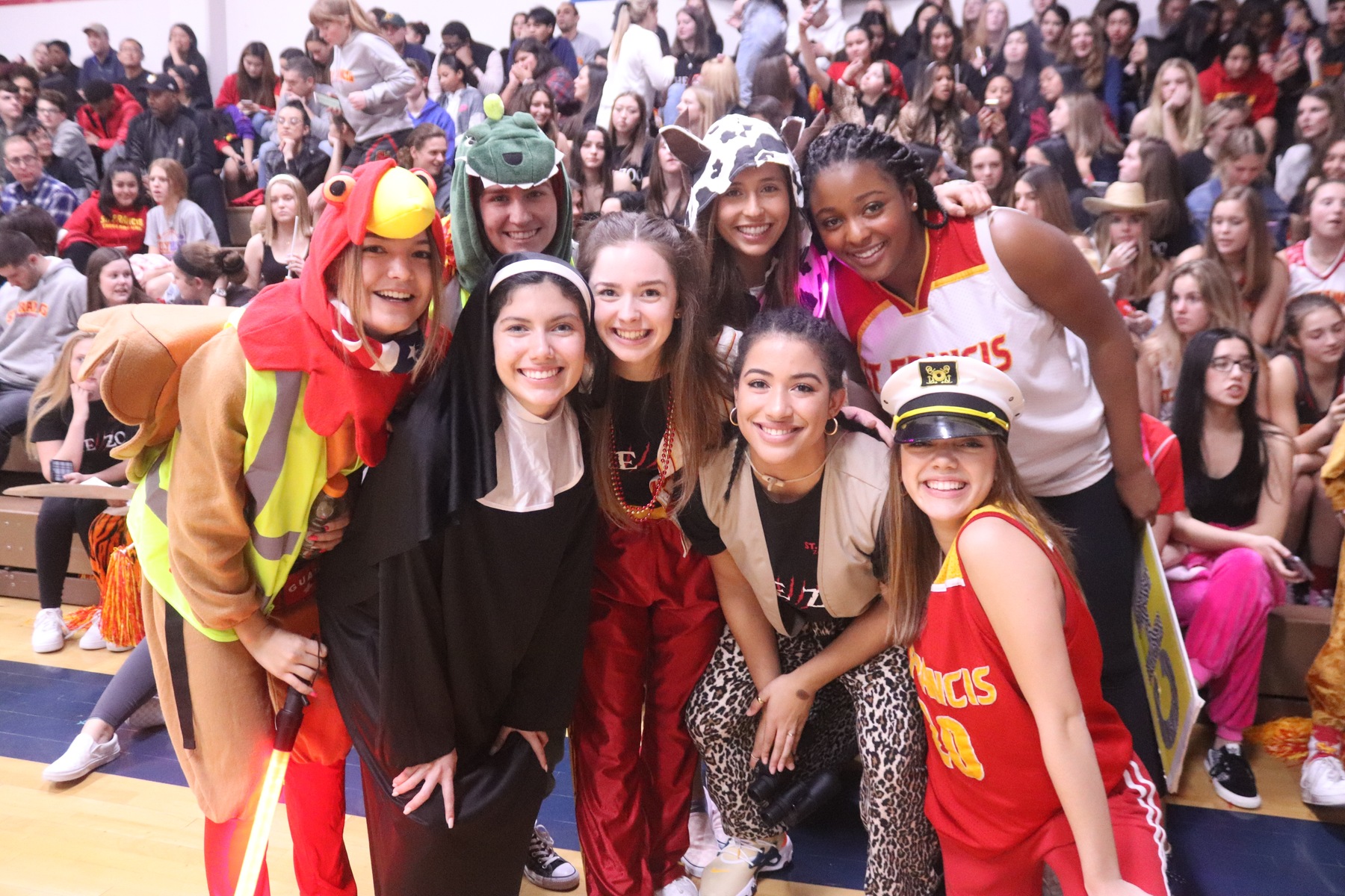 Basketball Falls in Holy Hoops; JV Teams Post Victories over Falcons