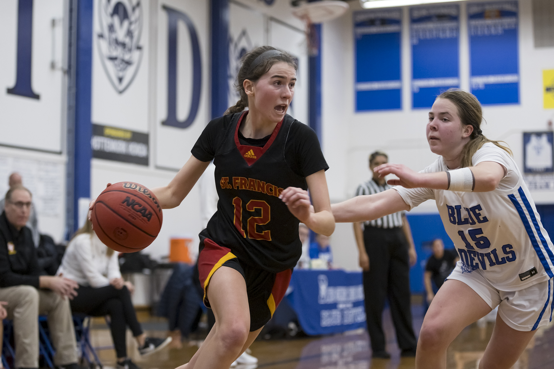 Troubie hoop sweeps Blue Devils in road action