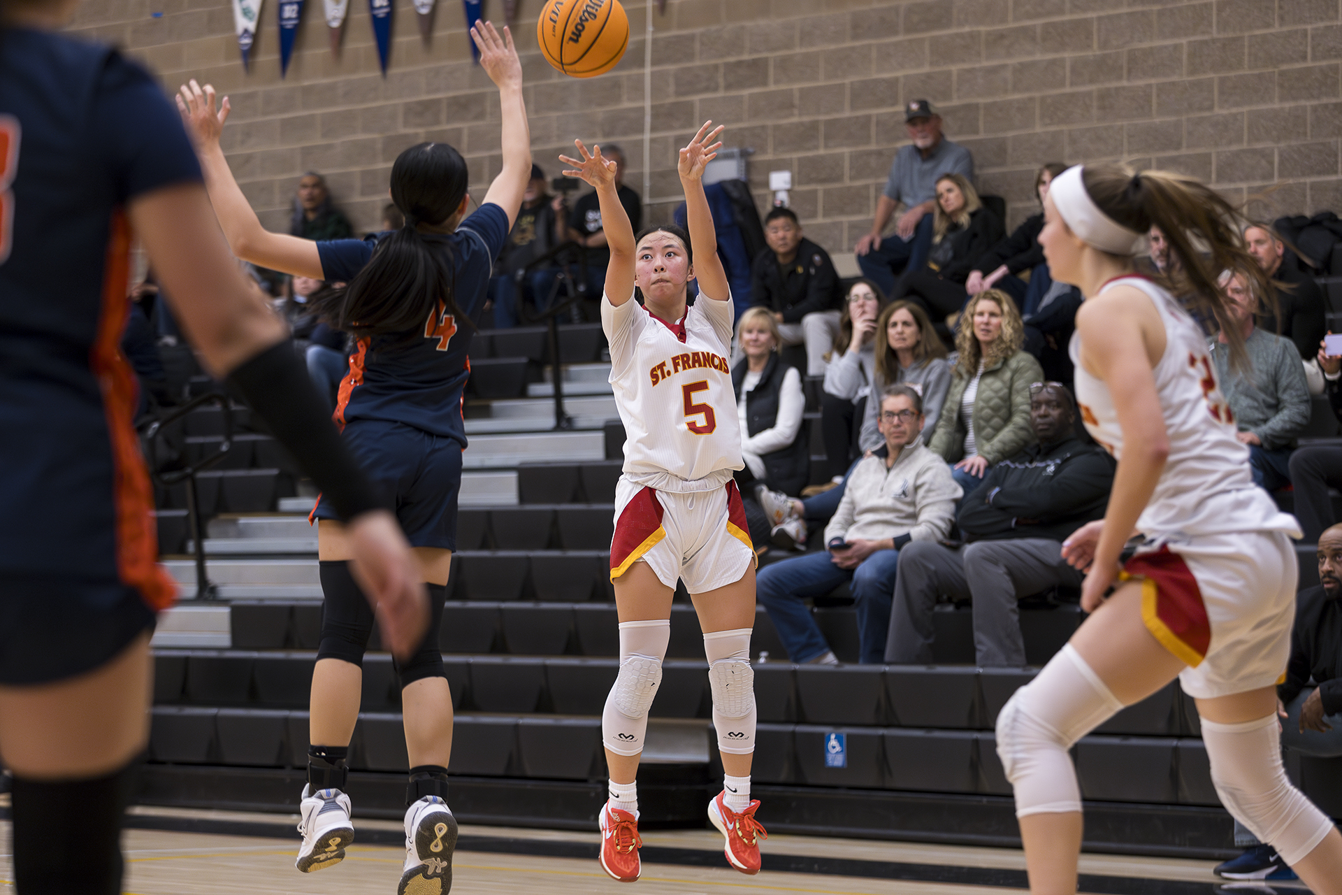 SF prevails in battle of league hoop leaders