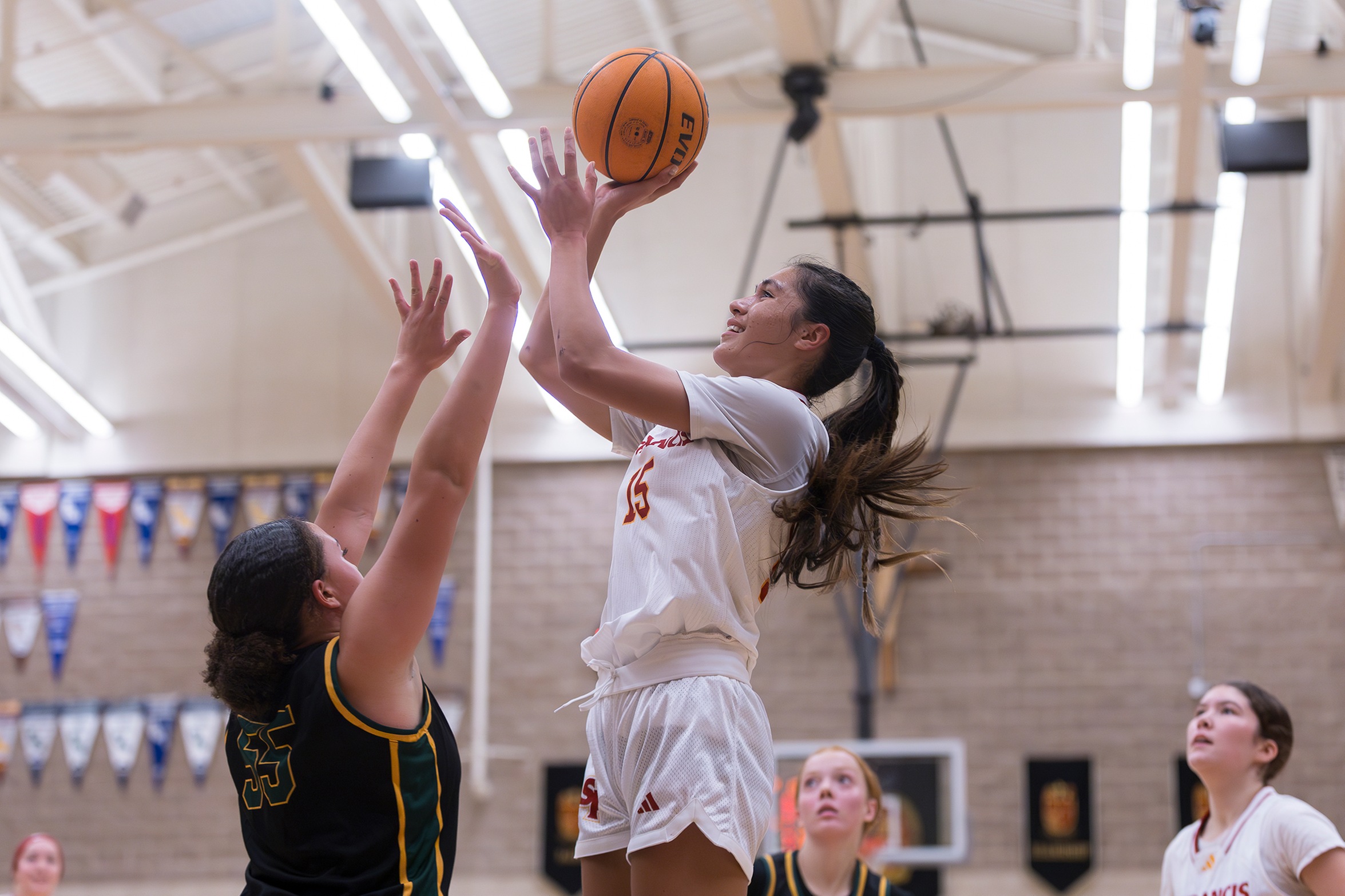 Troubies rock Raiders for season's first hoop win