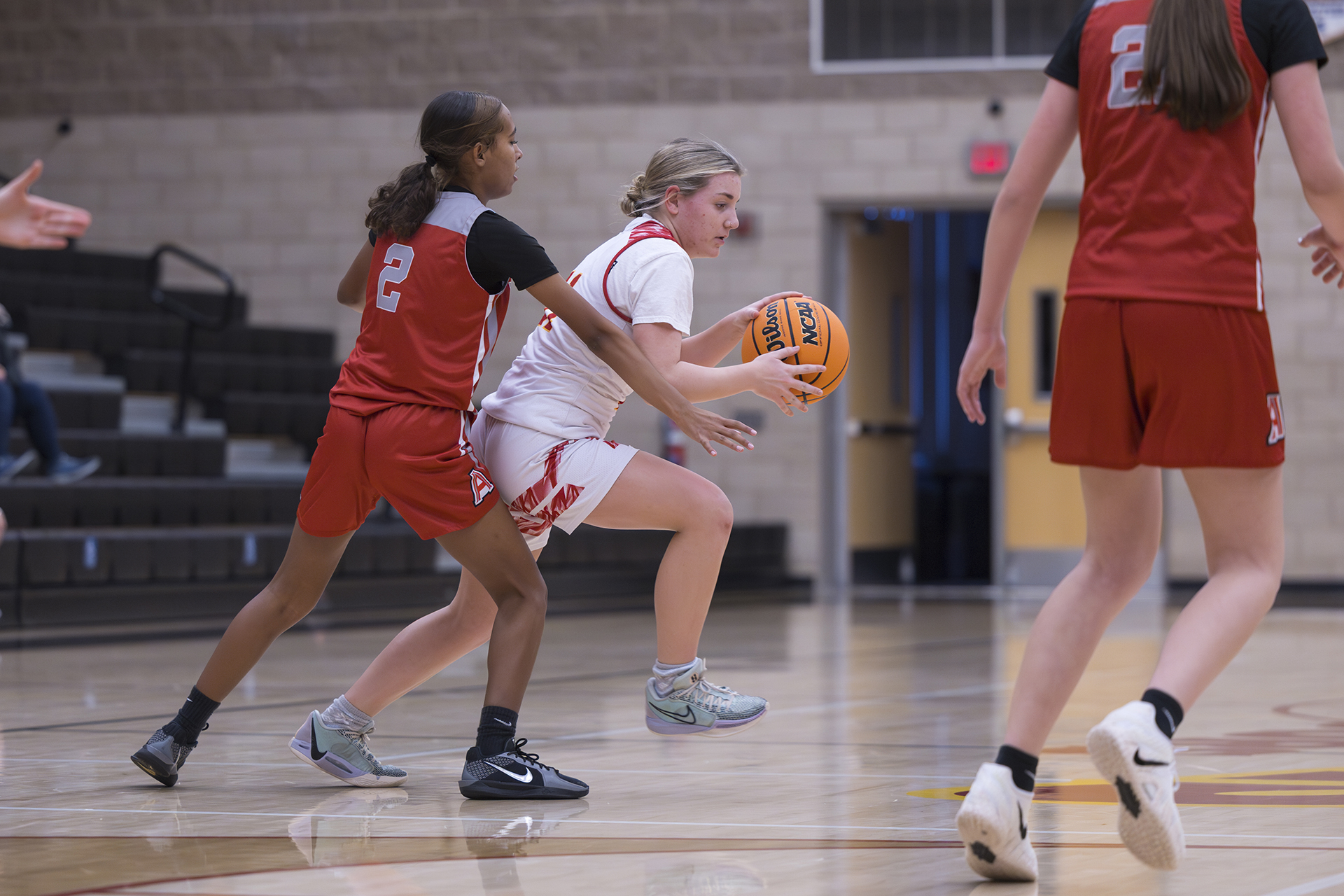 St. Francis JV hoop split results at split sites