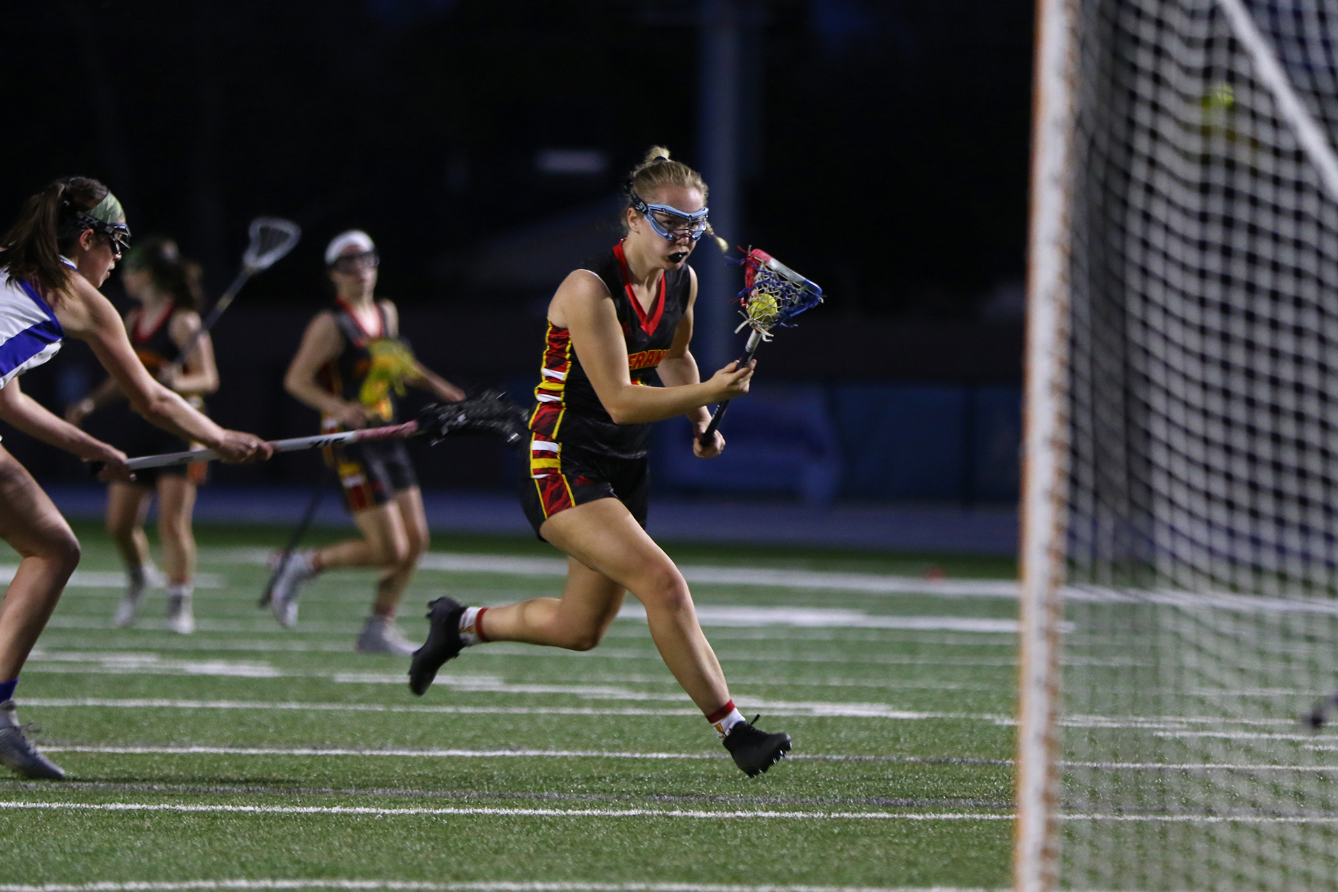 Troubies roll past Raiders in Delta League LAX finale