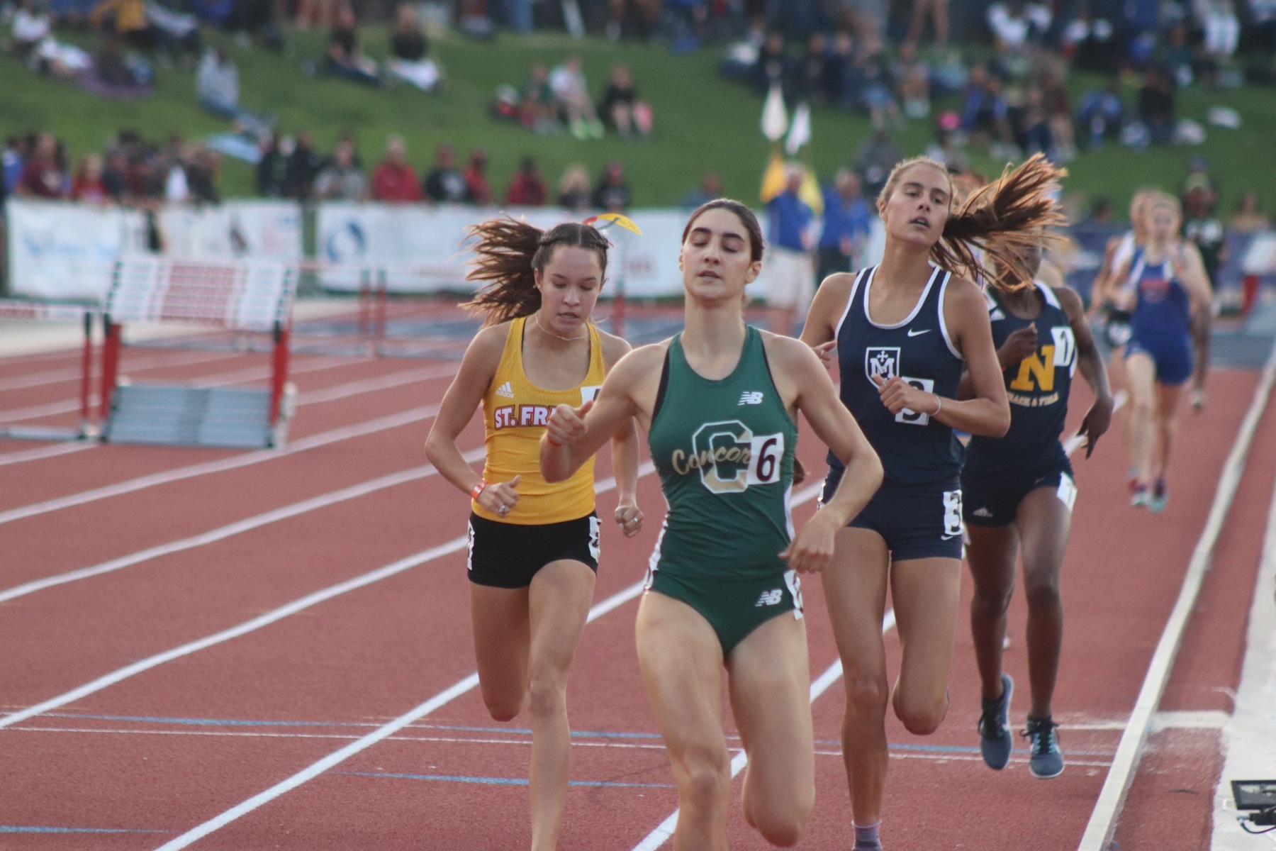 Johnson and Fauria Advance at Track State Championships